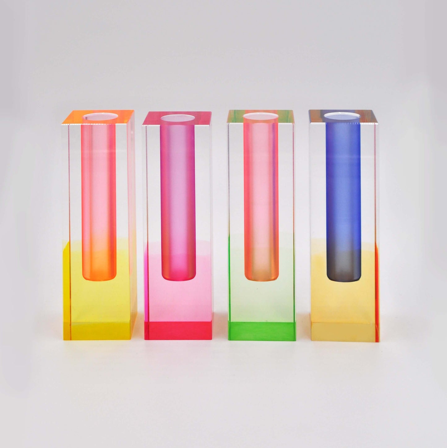 a group of acrylic vase