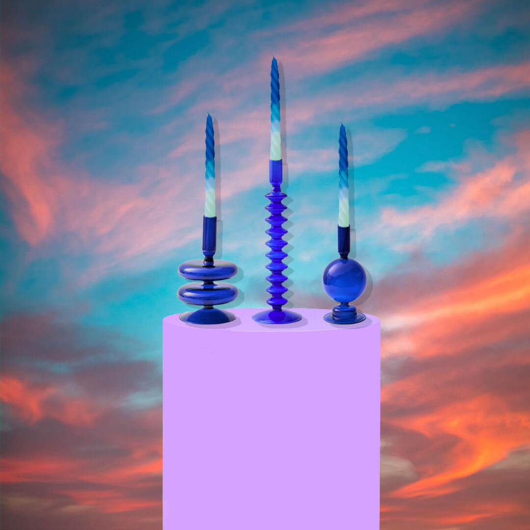 Shades of Blueberry Candles on a candle holders